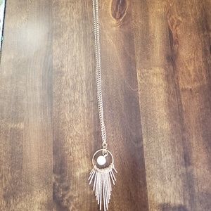 Art Deco style gold colored necklace with faux pearl